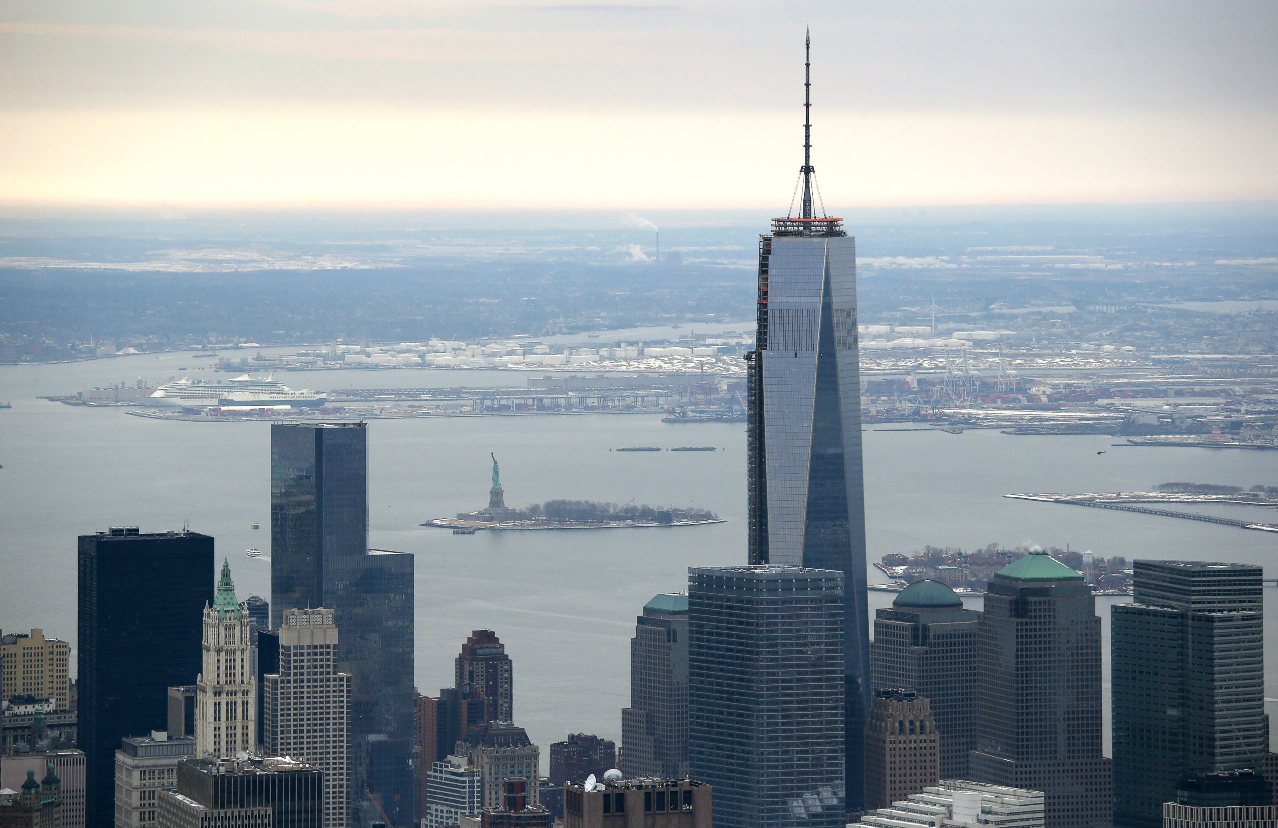 PHOTO: One World Trade Center, the tallest building in the Western Hemisphere, rises over downtown Manhattan, as seen from the window of a Customs and Border Protection (CBP), Jan. 31, 2014, in New York.