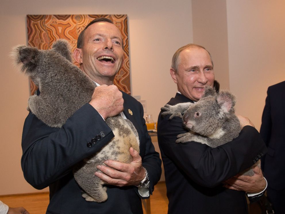 PHOTO: Australias Prime Minister Tony Abbott and Russias President Vladimir Putin