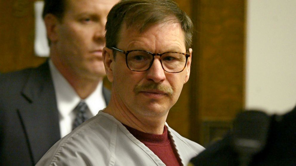 Gary Ridgway prepares to leave the courtroom where he was sentenced in King County Washington Superior Court, Dec. 18, 2003, in Seattle.