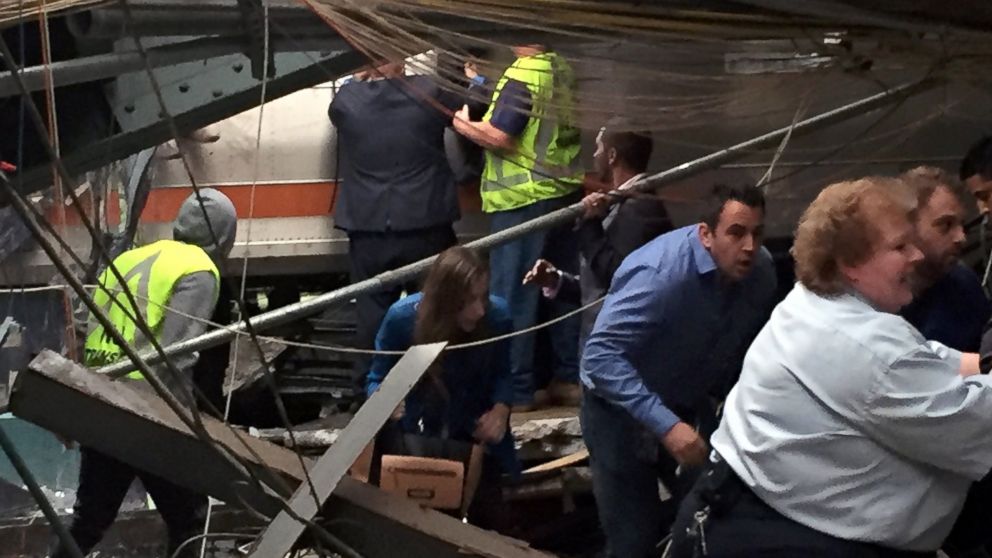 PHOTO: Passengers rush to safety after a NJ Transit train crashed in to the platform at the Hoboken Terminal, Sept. 29, 2016, in Hoboken, New Jersey.