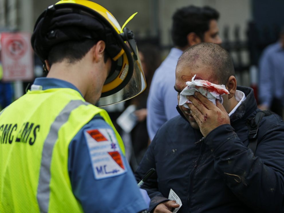 PHOTO: People are treated for their injuries outside after a NJ Transit train crashed in to the platform at Hoboken Terminal Sept. 29, 2016 in Hoboken, New Jersey.