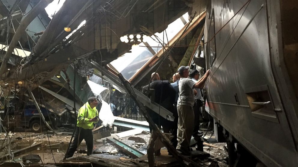 Train personnel survey the NJ Transit train that crashed in to the platform at the Hoboken Terminal Sept. 29, 2016 in Hoboken, New Jersey.