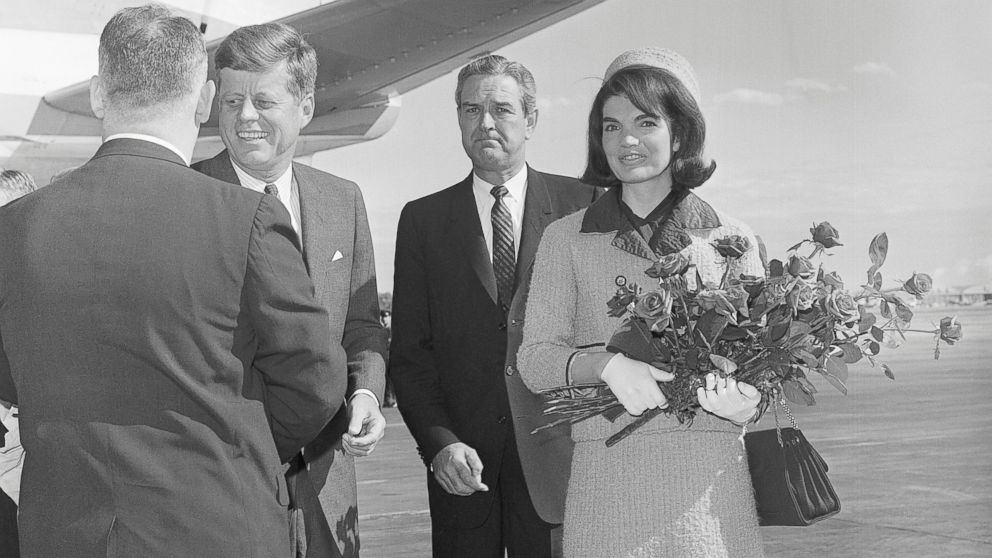 President Kennedy stands on a Texas airstrip with Jackie Kennedy and Governor John Connally, Nov. 22, 1963.