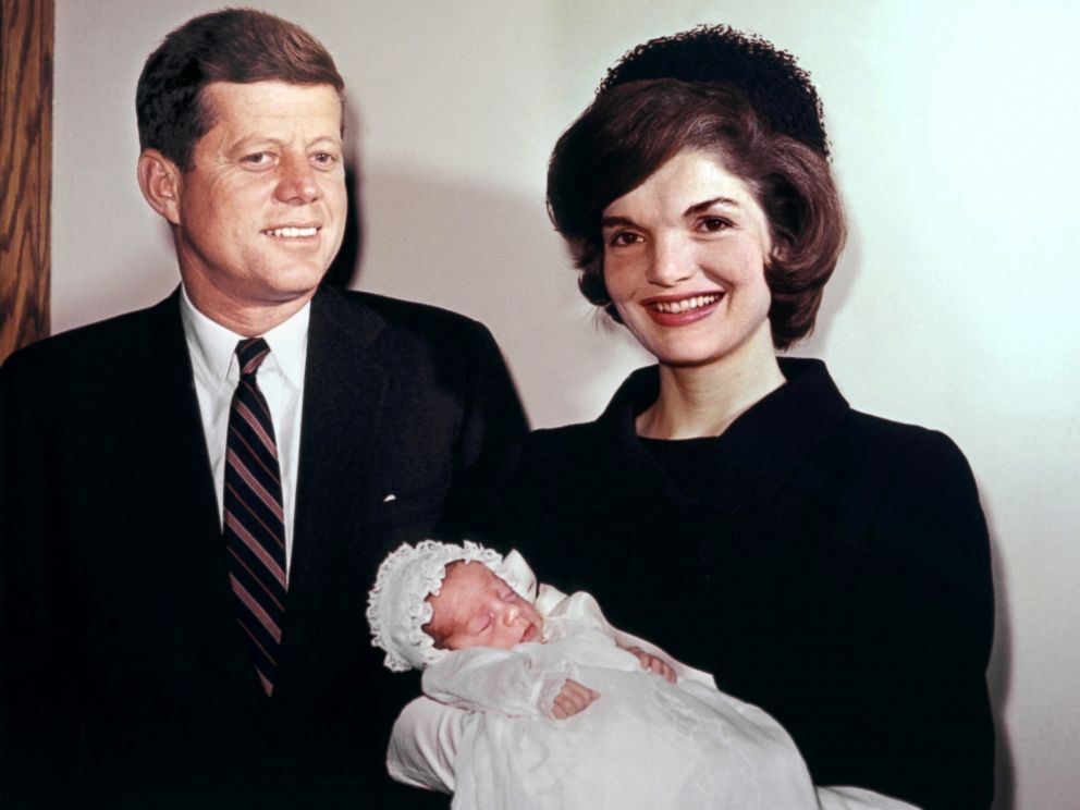 PHOTO: US Senator John Fitzgerald Kennedy his wife Jacqueline pose with their son John, Dec. 10, 1960.