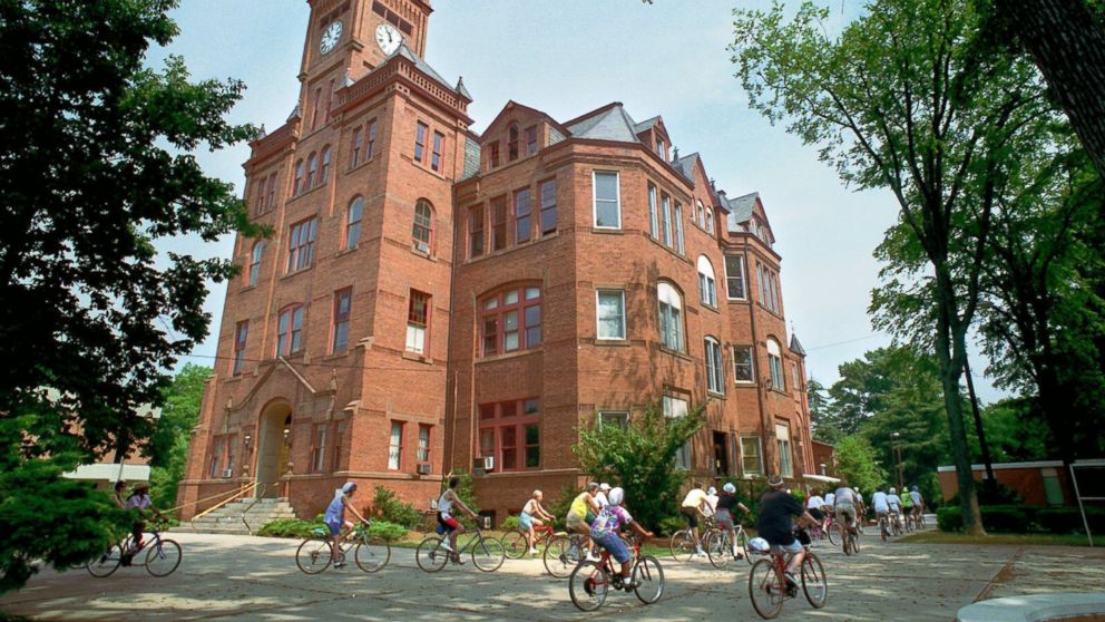 In this June 14, 1993 file photograph, participants in a history bicycle tour pass Biddle Hall at Johnson C. Smith University in Charlotte, N.C. 