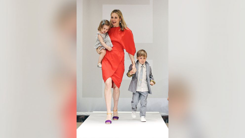 PHOTO: Kelly Rutherford, son Hermes, and daughter Helena walk the runway the Fendi Kid's SS11 Domestic Debit Fashion presentation on April 14, 2011 in New York City.