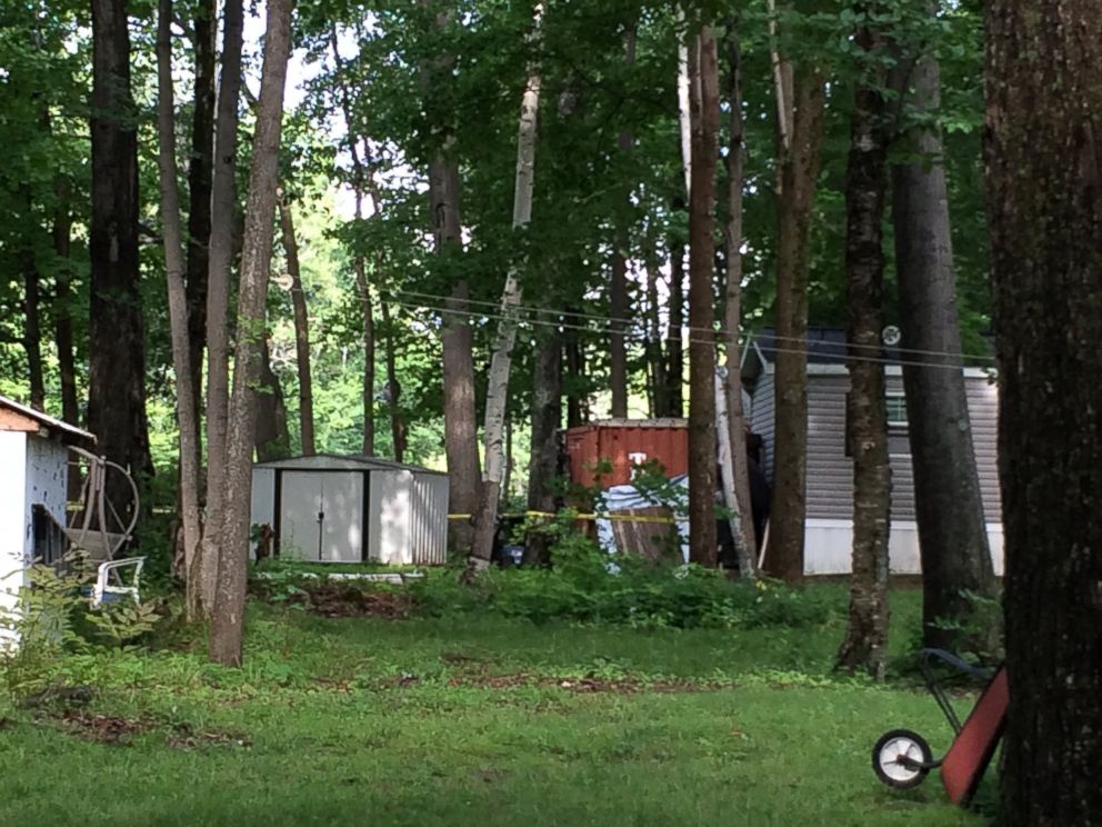 PHOTO: A red cargo container can be seen on the property of Nathaniel Kibby in Gorham, N.H., July 29, 2014.