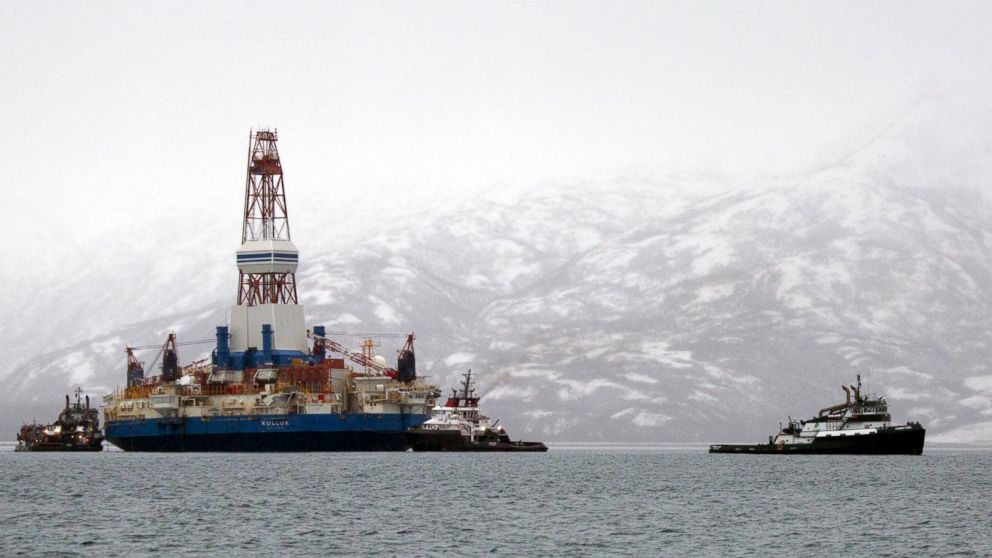 Salvage teams conduct an assessment of Shell's Kulluk drill barge, which ran aground in 2012.