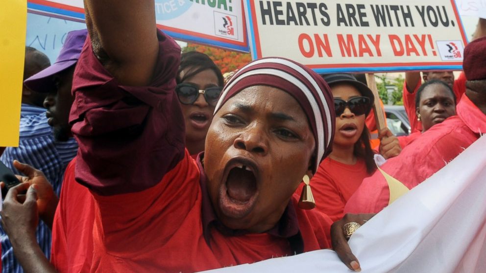 PHOTO: Members of civil society groups hold placards and shout slogans as they protest the abduction of Chibok school girls during a rally pressing for the girls' release in Abuja, May 6, 2014. 