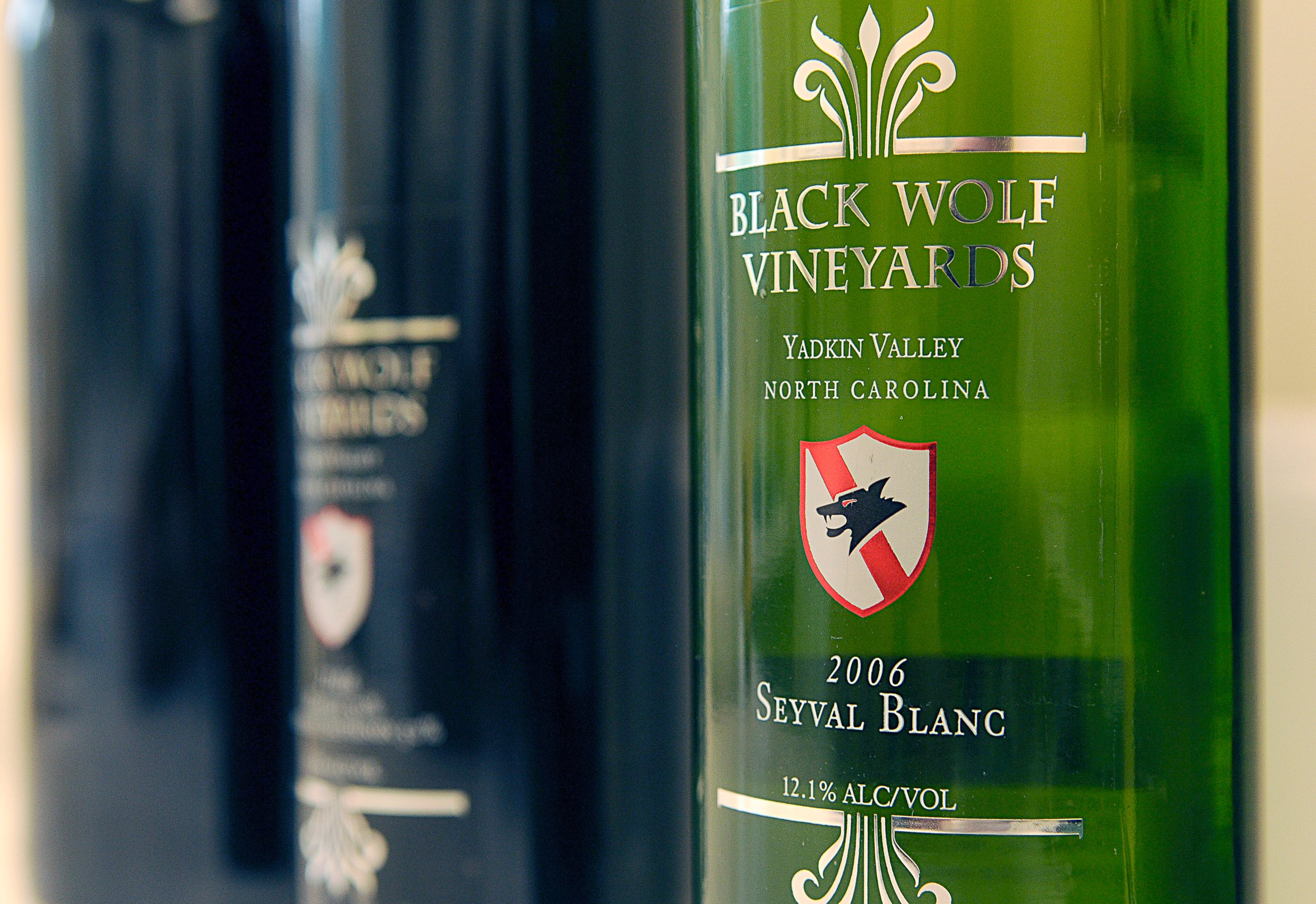 PHOTO: Bottles of Black Wolf Vineyards wine sit in the winery lab for inspection by potential bidders during the vineyard auction in Dobson, North Carolina, Aug. 20, 2010.