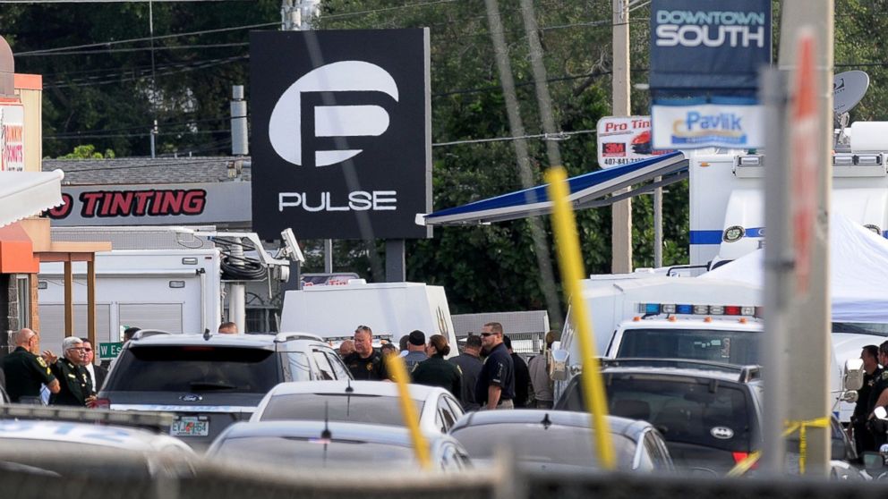 PHOTO: Orlando police officers are seen outside of Pulse nightclub after a fatal shooting and hostage situation on June 12, 2016 in Orlando, Fla. 