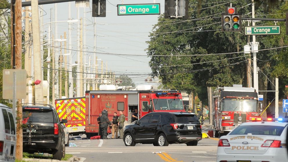 Orlando police officers are seen outside of Pulse nightclub after a fatal shooting and hostage situation on June 12, 2016 in Orlando, Fla. 