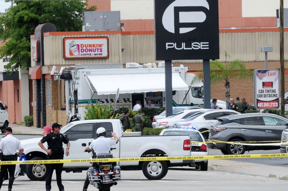 PHOTO: Orlando police officers seen outside of Pulse nightclub after a fatal shooting and hostage situation, June 12, 2016, in Orlando, Fla.   