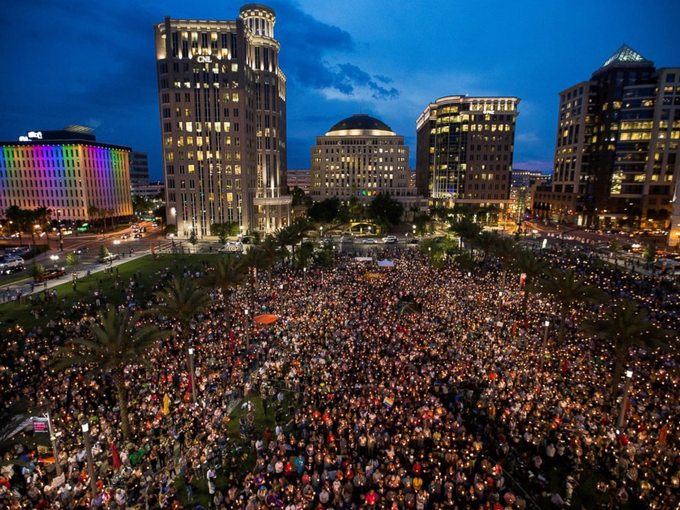 PHOTO:Thousands gather at the Dr. Phillips Center for the Performing Arts to pay their respects for those lost in the Pulse nightclub shooting in Orlando, Fla., June 13, 2016.