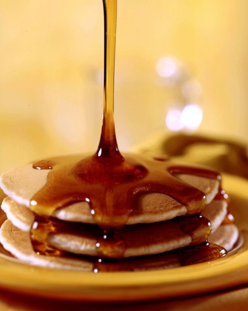 PHOTO: Pancakes topped with maple syrup.
