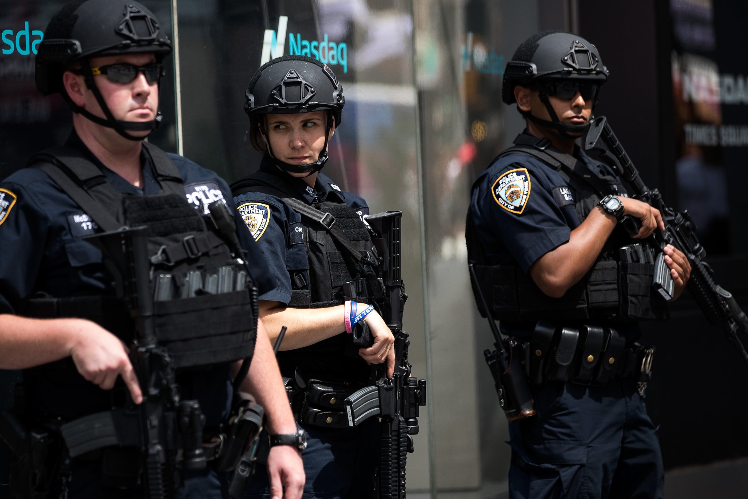PHOTO: Members of the New York City Police Department stand guard in Times Square, July 15, 2016 in New York City.