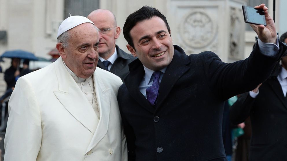 Antonio Di Lucia, right, is pictured taking a "selfie" with Pope Francis, left, at St. Peter's Square on Jan. 22, 2014 at the Vatican.