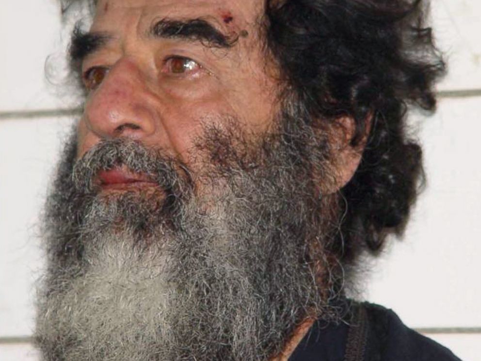 PHOTO: A handout photo of Saddam Hussein after his capture in Iraq, Dec. 14, 2003.