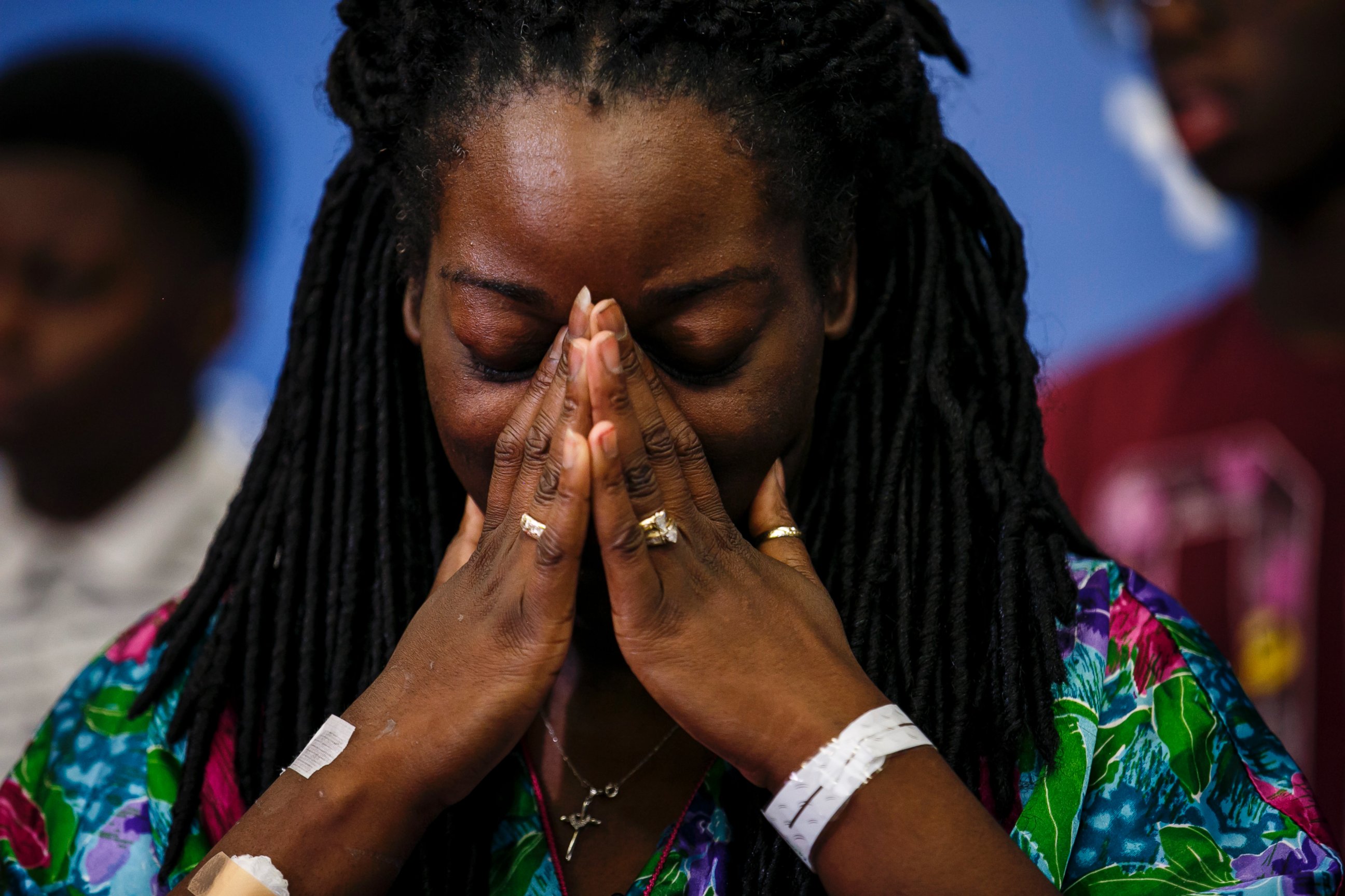 PHOTO: Shetamia Taylor gets emotional as her sons tell reporters of their account of the deadly night when a gunman attacked and killed 5 police officers and wounding 7 others, including Taylor, during a press conference in Dallas, Texas,  July 10, 2016. 