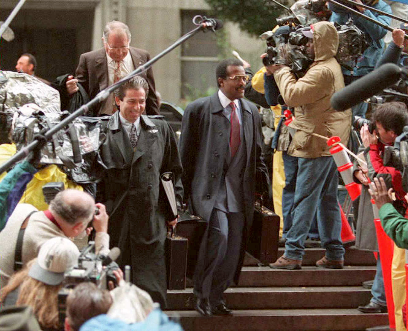 PHOTO: Defense attorneys Johnnie Cochran and Robert Kardashian arrive for the opening statements in the O.J. Simpson double murder trial in Los Angeles, Jan. 24, 1995.