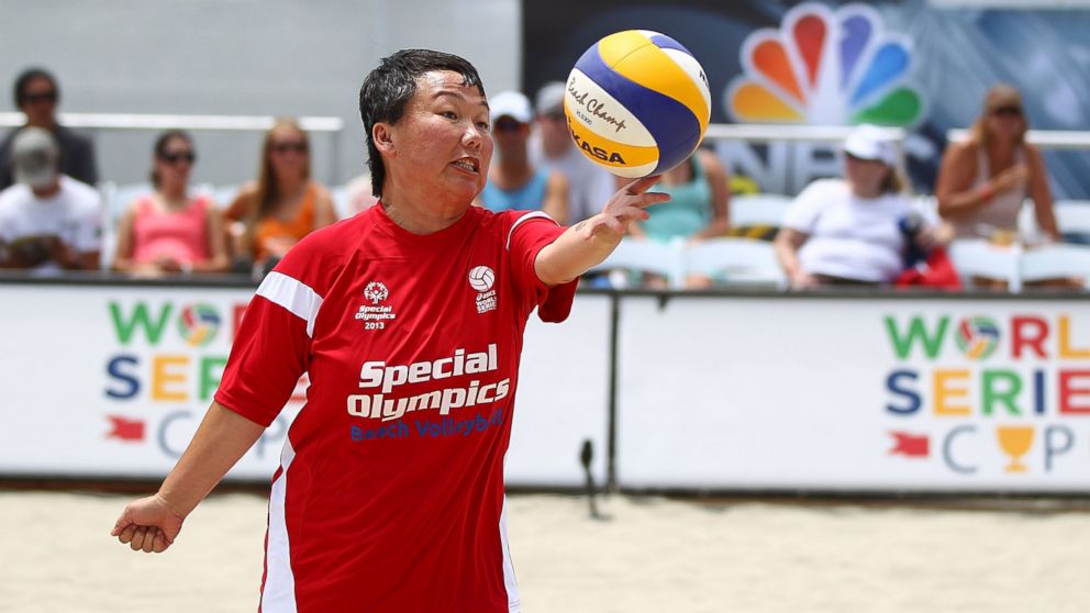A Special Olympian serves during a Special Olympic match at the ASICS World Series Cup - Day 2 in Long Beach, Calif., July 28, 2013.  