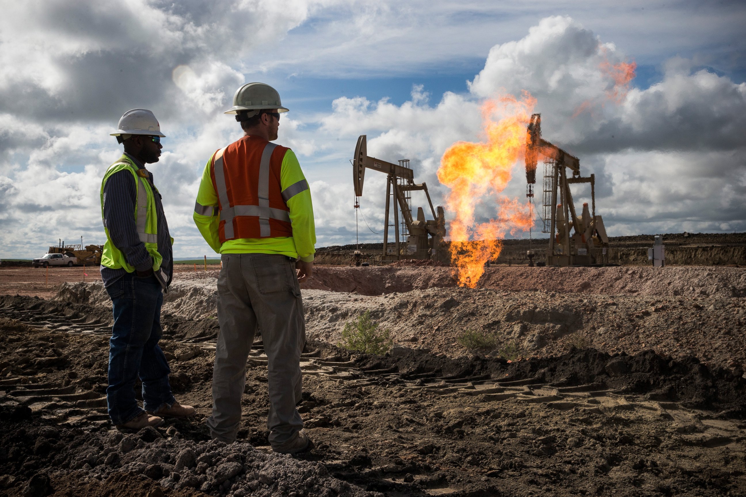 PHOTO: Gas flares is seen at an oil well site on July 26, 2013 outside Williston, North Dakota. 