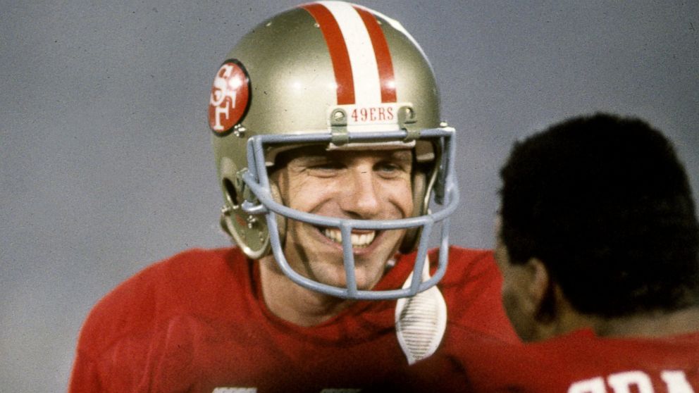 PHOTO: San Francisco 49ers Hall of Fame quarterback Joe Montana is all smiles as he talks to running back Roger Craig during Super Bowl XIX, Jan. 20, 1985, at Stanford Stadium in Stanford, Calif.