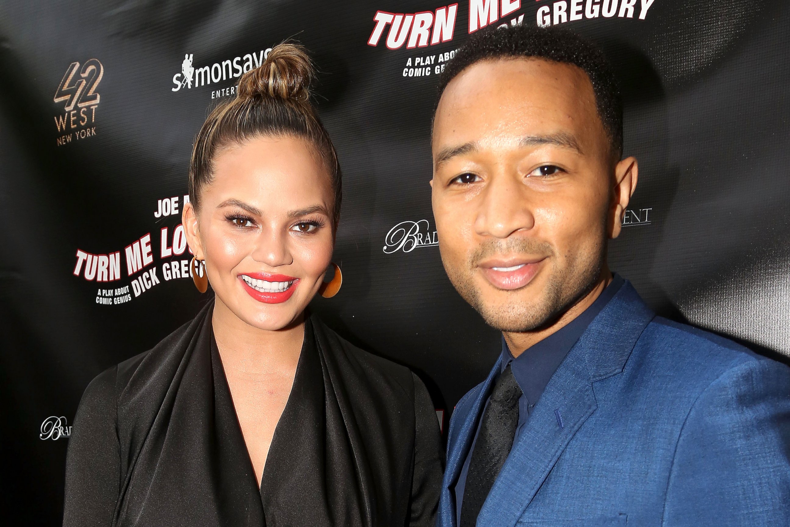 PHOTO: Chrissy Teigen and John Legend pose at The Opening Night of "Turn Me Loose" at The Westside Theatre, May 19, 2016, in New York City.