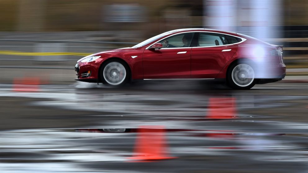 PHOTO: Clients and media were offered an opportunity to drive the Tesla Motors P85D Model S during a demonstration at Sports Authority Field in Denver, March 13, 2015.