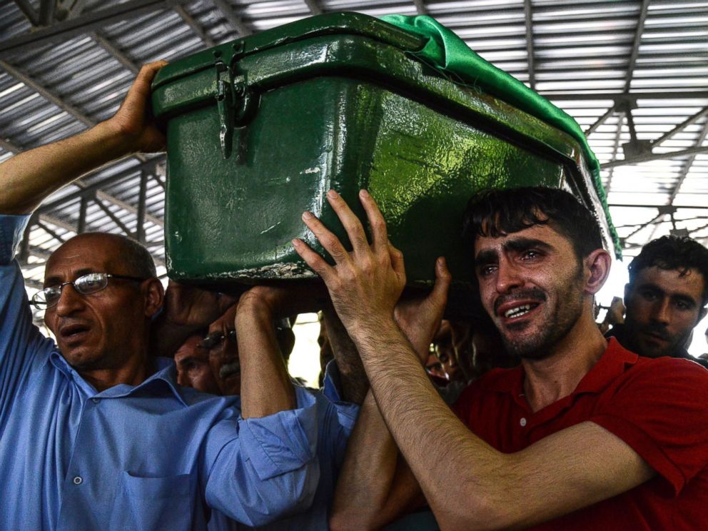 PHOTO: A man cries as he carries a coffin during a funeral for victims of the attack on a wedding party that left 50 dead in Gaziantep in southeastern Turkey near the Syrian border, Aug. 21, 2016.
