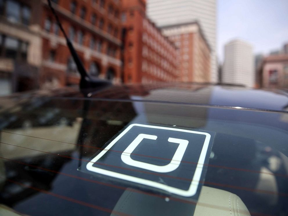 PHOTO: Uber driver Dean Johnson waits for a customer outside South Station in Boston, April 22, 2016.