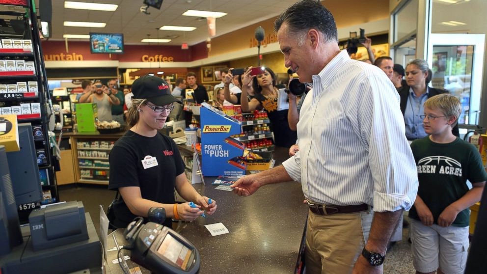 PHOTO: Mitt Romney prepares to pay for a sandwich in a WaWa Gas Station,  June 16, 2012, in Quakertown, Pa.