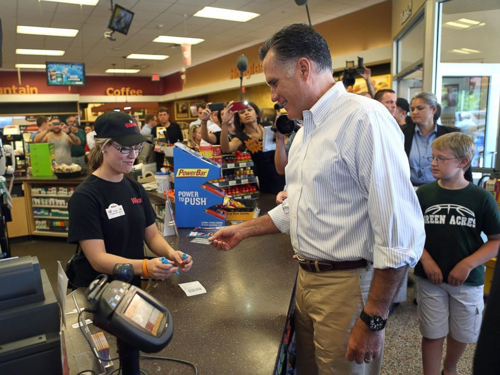 PHOTO: Mitt Romney prepares to pay for a sandwich in a WaWa Gas Station, June 16, 2012, in Quakertown, Pa.