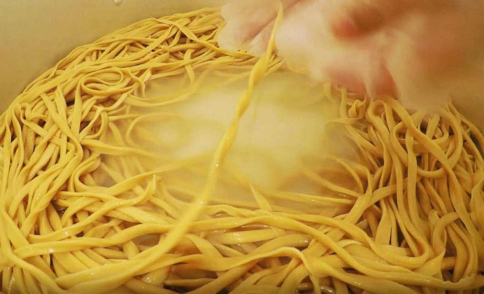 PHOTO: Hiroshi Kuroda broke the world record for longest handmade egg noodle.