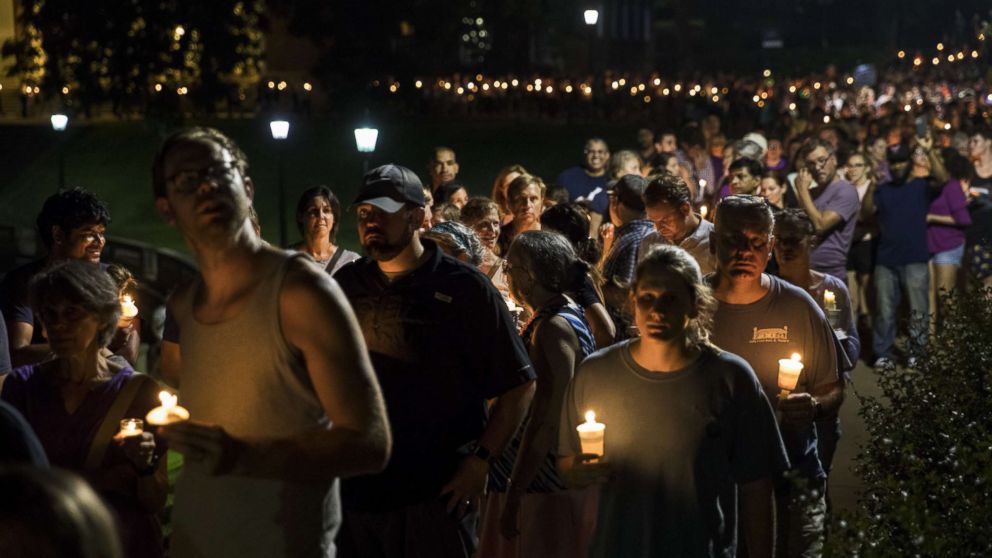 PHOTO: Thousands gather with candles to march along the path that white supremacists took the prior Friday with torches on the University of Virginia Campus in Charlottesville, United States on August 16, 2017.