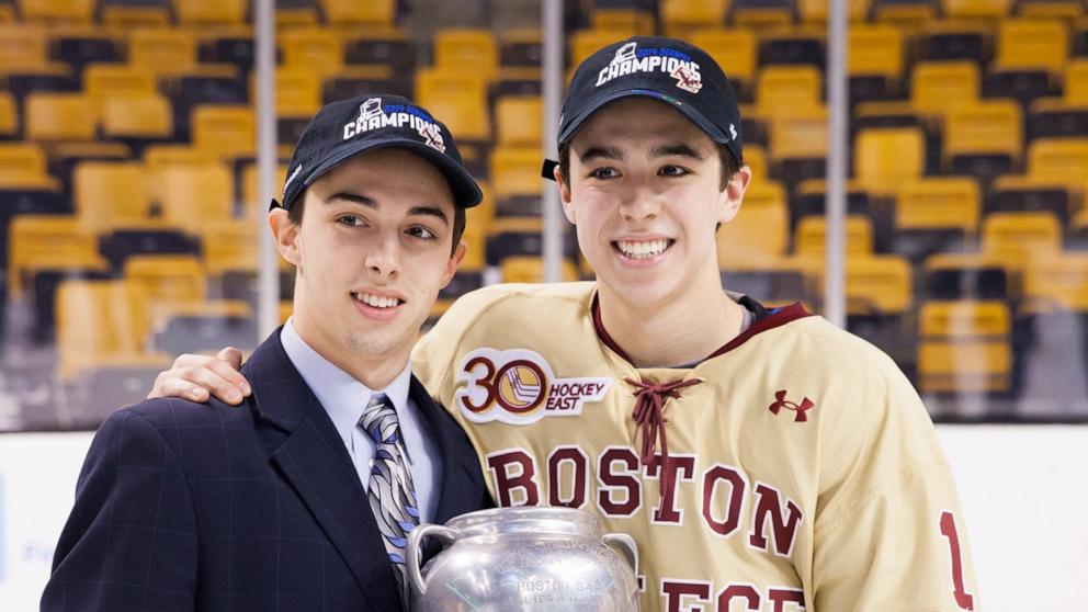 PHOTO: Johnny Gaudreau #13 and Matthew Gaudreau #21 of the Boston College Eagles celebrate after the Eagles beat the Northeastern University Huskies to win their fifth Beanpot Championship in a row, Feb. 10, 2014, in Boston.