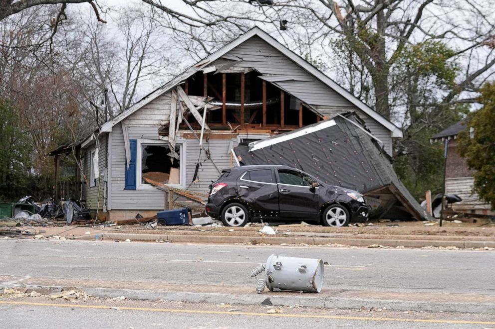 PHOTO: A power transformer sits in a street infant of a storm-damaged building, Jan. 13, 2023, in Griffin, Ga. Powerful storms passed through the area causing tornadoes.