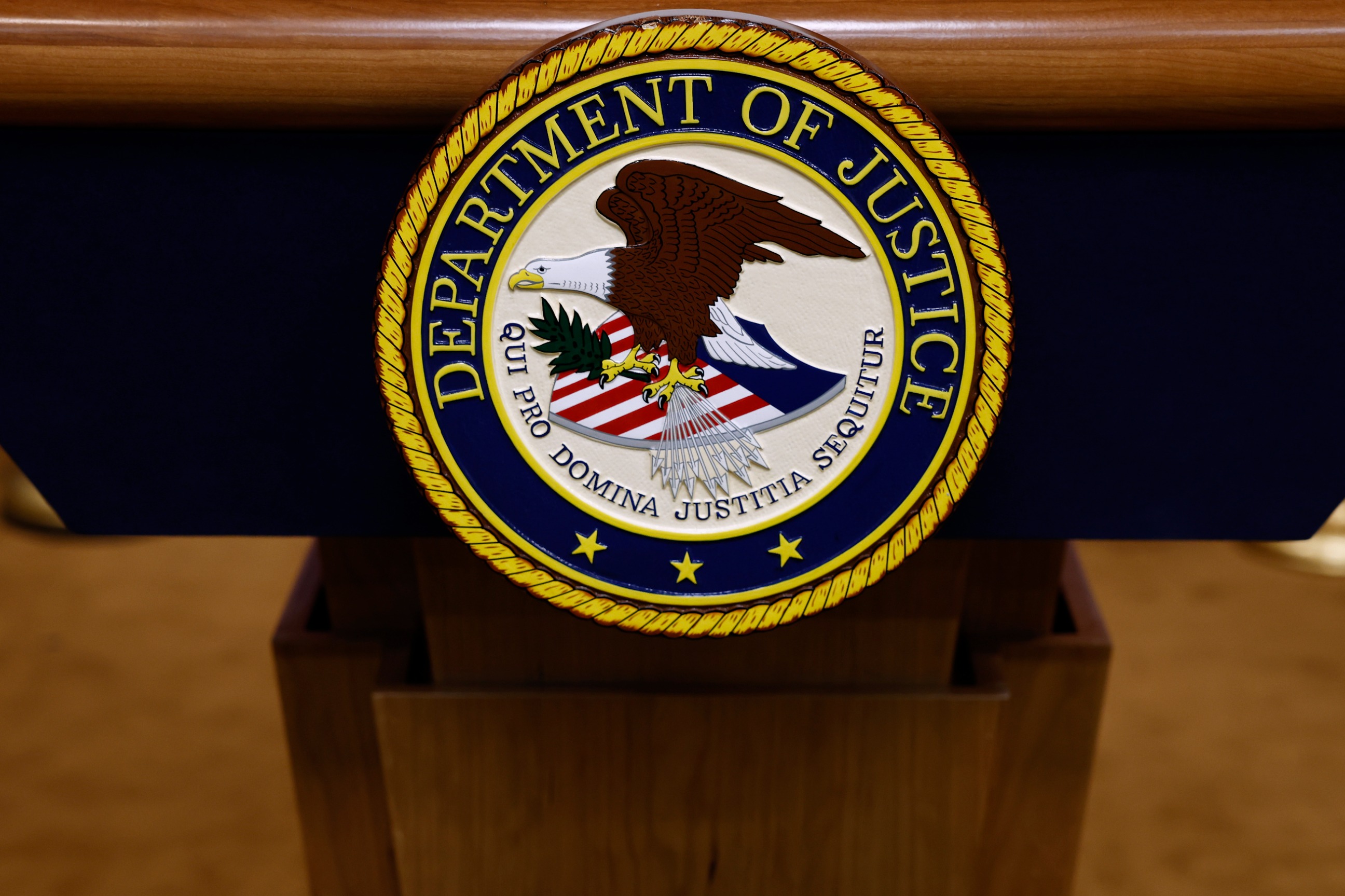 A seal for the Department of Justice is seen on a podium ahead of a news conference with U.S. Attorney General Merrick Garland at the Department of Justice Building on March 21, 2024, in Washington, D.C. (Photo by Anna Moneymaker/Getty Images)