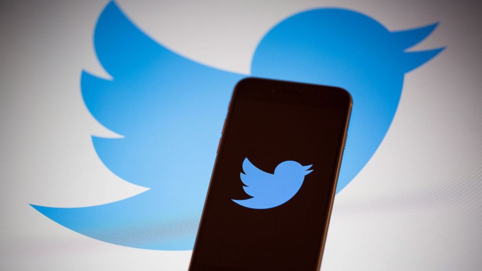 The Twitter Inc. logo is displayed on the screen of an Apple Inc. iPhone 6s in this arranged photograph taken in New York, U.S., on Tuesday, Feb. 9, 2016. Twitter Inc. is changing its timeline to display popular tweets first, instead of the latest posts, a long-anticipated step thats likely to anger its most passionate users. Twitter is scheduled to report quarterly earnings results following the close of U.S. financial markets on February 10. Photographer: Michael Nagle/Bloomberg via Getty Images
