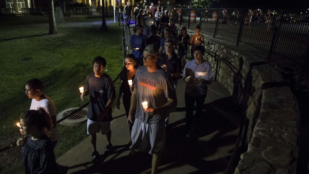 PHOTO: Thousands gather with candles to march along the path that white supremacists took the prior Friday with torches on the University of Virginia Campus in Charlottesville, United States on August 16, 2017.