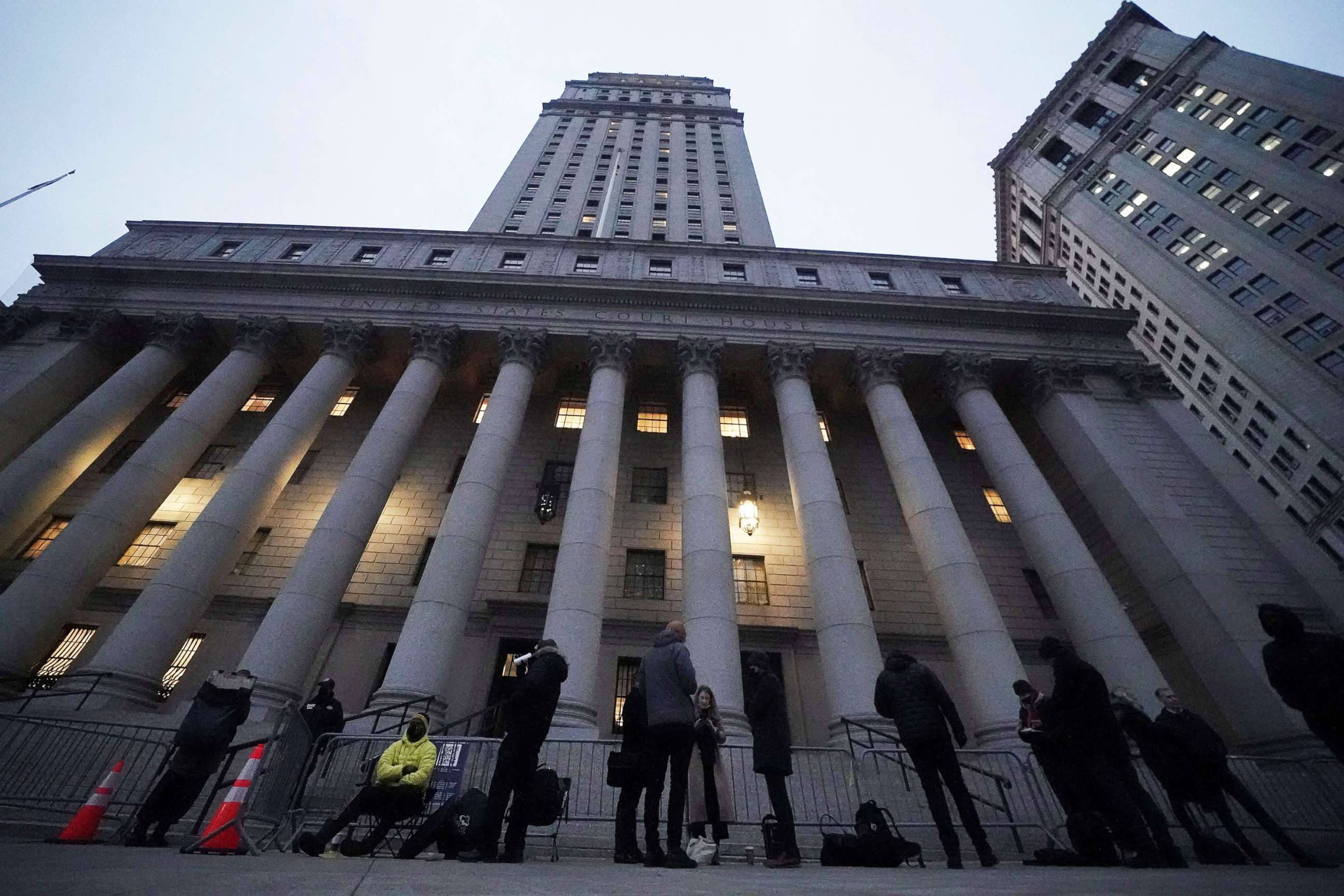 PHOTO: People line up to enter the court for the second day of the Ghislaine Maxwell trial in New York, Nov. 30, 2021. 