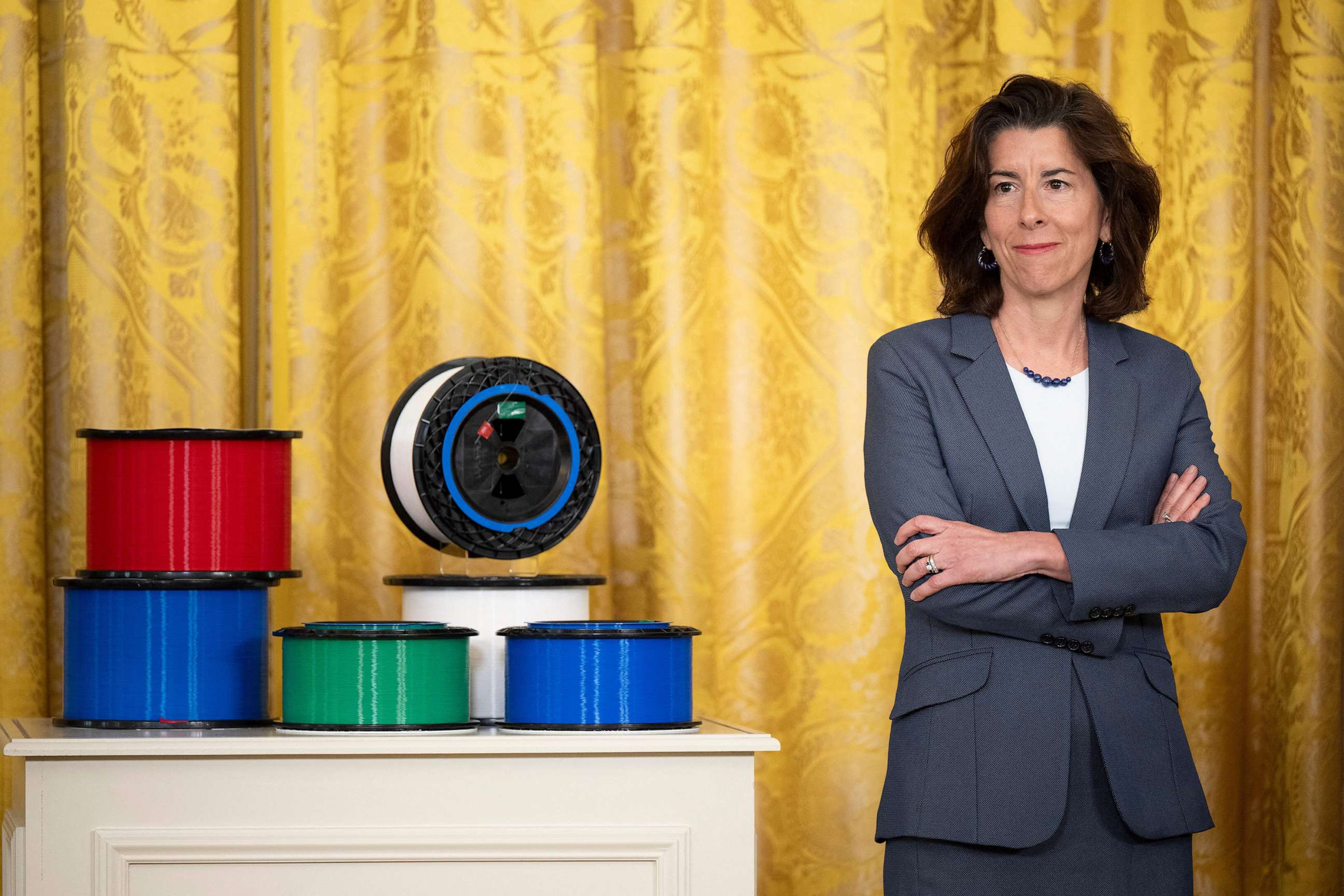 PHOTO: U.S. Secretary of Commerce Gina Raimondo looks on during a high-speed internet infrastructure announcement in the East Room of the White House, June 26, 2023, in Washington.