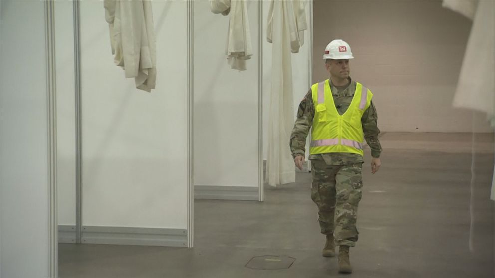 PHOTO: Lt. Col. Greg Turner, of the U.S. Army Corps of Engineers, Detroit District, walks among the soon-to-be makeshift hospital rooms at the TCF Center in downtown Detroit. 

