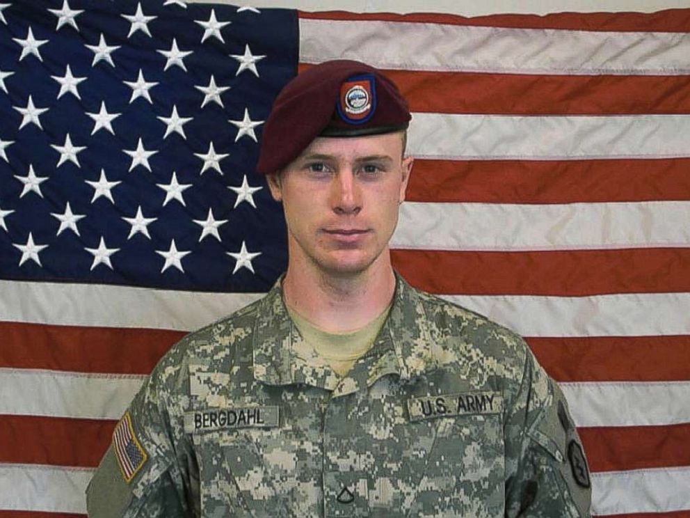 PHOTO: In this undated image provided by the U.S. Army, Sgt. Bowe Bergdahl poses in front of an American flag.