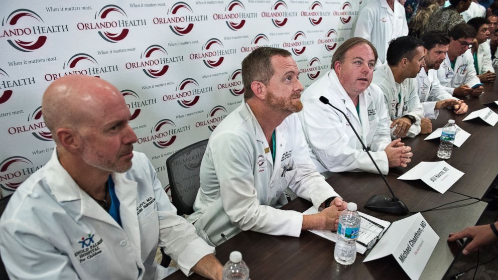 Doctors take questions from reporters after a press conference with Orlando Health trauma staff at Orlando Regional Medical Center, June, 14, 2016 in Orlando, Florida. Two days after 49 people were killed and dozens of others grievously injured in America's deadliest mass shooting.