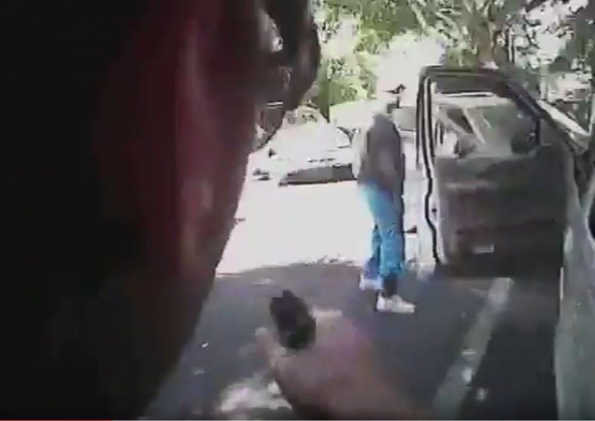 PHOTO: This police body camera screen grab courtesy of a Charlotte-Mecklenburg Police Department video released, Sept. 24, 2016, shows Keith Lamont Scott (R) looking on as a police officer approaches in Charlotte, North Carolina, Sept. 20, 2016.
