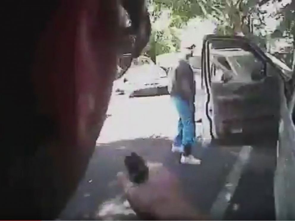 PHOTO: This police body camera screen grab courtesy of a Charlotte-Mecklenburg Police Department video released, Sept. 24, 2016, shows Keith Lamont Scott (R) looking on as a police officer approaches in Charlotte, North Carolina, Sept. 20, 2016.
<p itemprop=