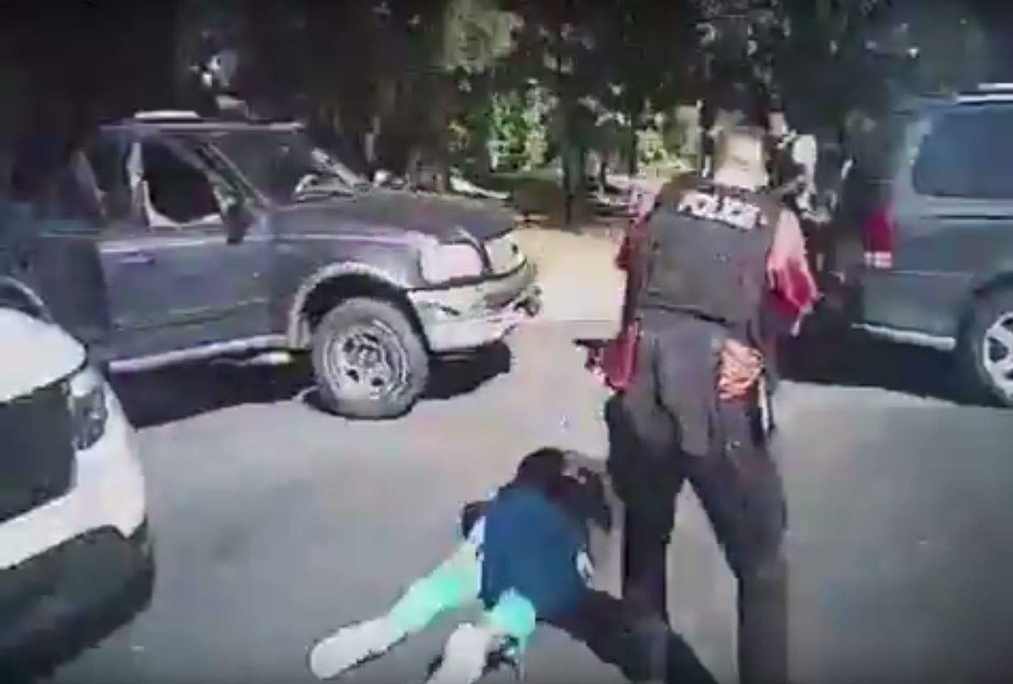 PHOTO: This police body camera screen grab that shows Keith Lamont Scott (L) lying on the ground after being shot as as a police officer approaches in Charlotte, North Carolina , Sept. 20, 2016.
