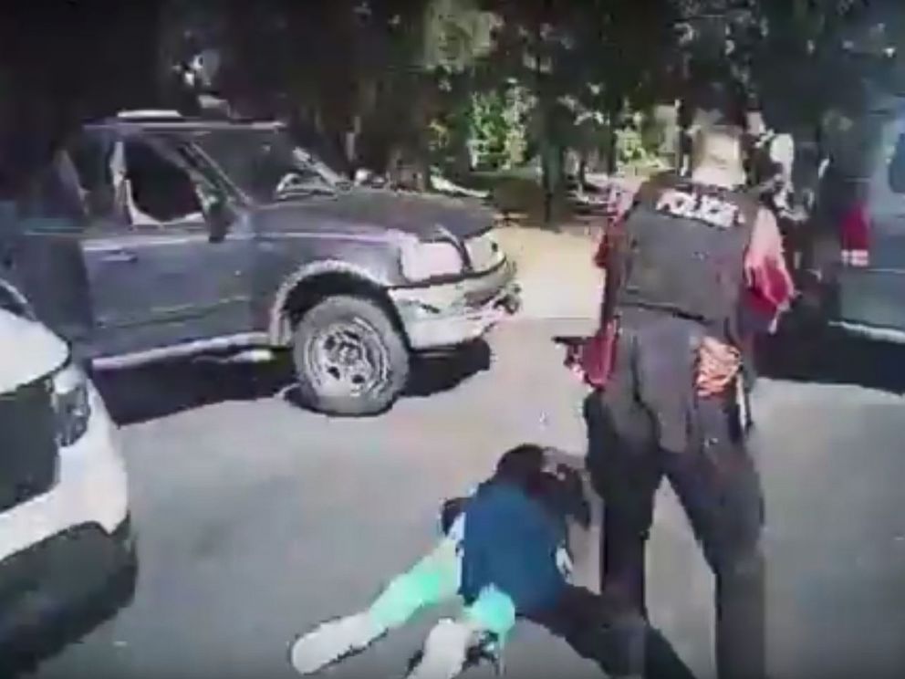 PHOTO: This police body camera screen grab that shows Keith Lamont Scott (L) lying on the ground after being shot as as a police officer approaches in Charlotte, North Carolina , Sept. 20, 2016.
<p itemprop=