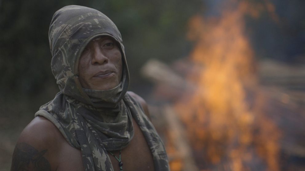 PHOTO: Laercio Guajajara and the "Guardians" burn the lumber they find to prevent illegal loggers from coming back to collect it.